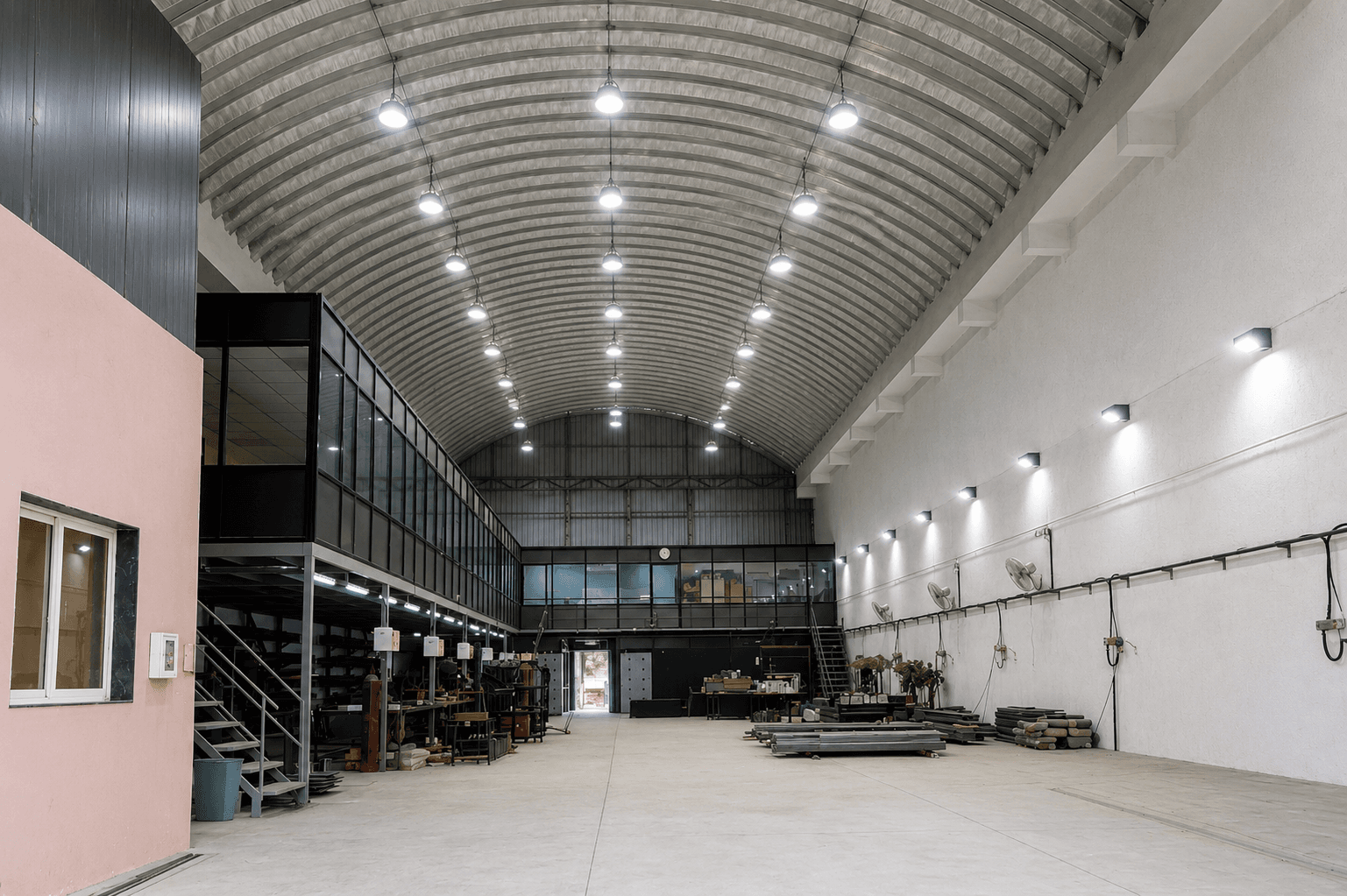Offside Works workshop shed interior — industrial steel structure, Surat